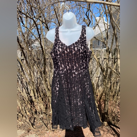 Disney Minnie Rocks the Dots black w/light pink lace dress size large
Pre loved - Picture 6 of 7